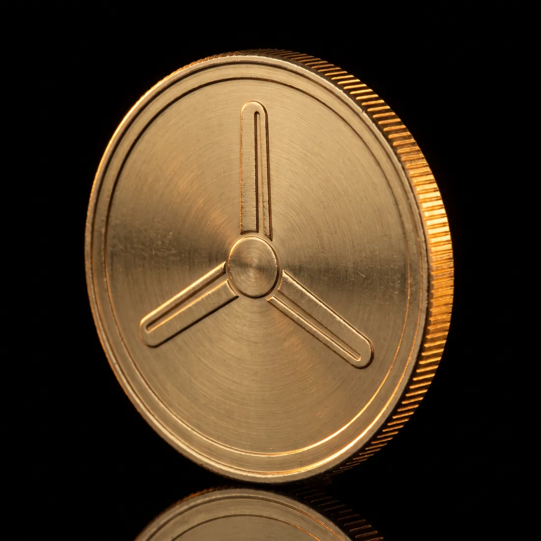 A gold $TURN metro token